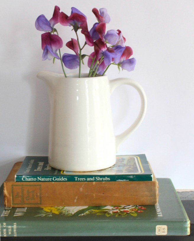 Book stack and sweet peas