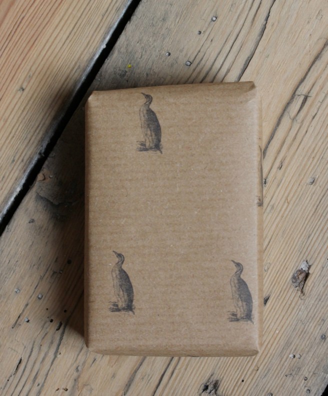 Home printed penguin Christmas wrapping paper