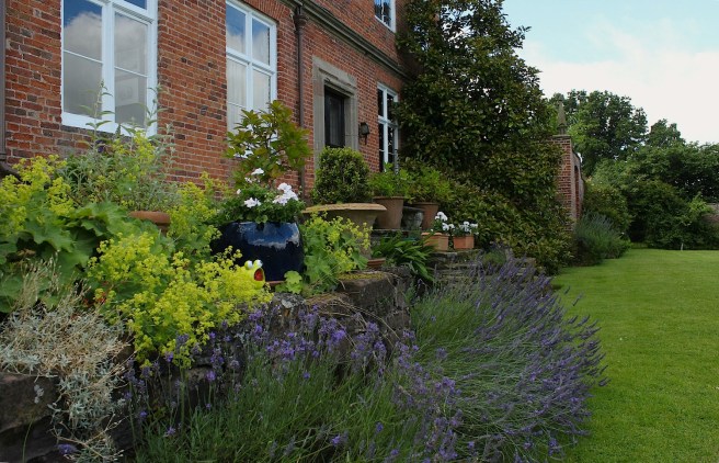 Country house with flowerbeds