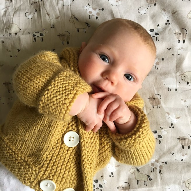 Hand knit baby cardigan